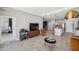 Open living space with view of the kitchen, dining, and front room, creating a seamless and inviting atmosphere at 4522 Tramanto Ln, Wesley Chapel, FL 33543