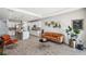 This lovely open floor plan connects the living area to the kitchen and bar with a beautiful island at 4522 Tramanto Ln, Wesley Chapel, FL 33543