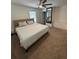 Spacious bedroom featuring a ceiling fan, large mirror, and dresser at 4632 Chatterton Way, Riverview, FL 33578
