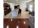 Bright and open kitchen with island seating and stainless steel appliances at 4632 Chatterton Way, Riverview, FL 33578