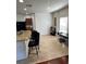 Modern kitchen with a breakfast bar and stainless steel appliances at 4632 Chatterton Way, Riverview, FL 33578