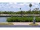 Picturesque view of the waterway, highlighting lush landscaping, access to docks, and serene waterfront living at 4851 W Gandy Blvd # B5L19, Tampa, FL 33611