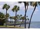 Waterfront community with palm trees, picnic pavilions, and inviting shoreline, promising a serene and active lifestyle at 4851 W Gandy Blvd # B5L19, Tampa, FL 33611