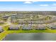 Aerial view of the neighborhood with lakefront homes at 4896 San Martino Dr, Wesley Chapel, FL 33543