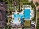 Aerial view of the community pool featuring a large pool and waterslide at 4896 San Martino Dr, Wesley Chapel, FL 33543
