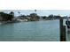 Scenic waterfront view of boats docked along the canal, ideal for boating enthusiasts and waterfront living at 525 Crystal Dr, Madeira Beach, FL 33708