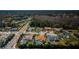 Aerial view of neighborhood featuring various homes, landscaping, pools, and tree lined streets at 5342 Sagamore Ct, New Port Richey, FL 34655