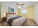 Cozy bedroom with a ceiling fan and plush carpet at 5342 Sagamore Ct, New Port Richey, FL 34655