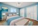 Stylish bedroom features hardwood floors and custom closet at 5342 Sagamore Ct, New Port Richey, FL 34655