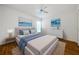 Comfortable bedroom with hardwood floors, soft lighting, and stylish decor at 5342 Sagamore Ct, New Port Richey, FL 34655