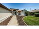 Welcoming front exterior with walkway, neutral colors, and attractive landscaping enhancing curb appeal at 5342 Sagamore Ct, New Port Richey, FL 34655