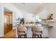 Beautiful kitchen with granite countertops, breakfast bar, and ample counter space, ideal for meal prep at 5342 Sagamore Ct, New Port Richey, FL 34655