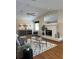 Inviting living room with fireplace, modern decor, and ample natural light, creating a cozy atmosphere at 5342 Sagamore Ct, New Port Richey, FL 34655