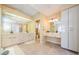 Elegant primary bathroom featuring dual sinks, vanity area, spacious layout, and bright lighting at 5342 Sagamore Ct, New Port Richey, FL 34655