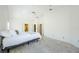 Spacious primary bedroom with carpet flooring and ensuite bathroom and walk-in closet access at 5342 Sagamore Ct, New Port Richey, FL 34655
