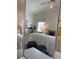 Bright main bedroom featuring plush bedding, modern decor, and a comfortable, inviting atmosphere at 5342 Sagamore Ct, New Port Richey, FL 34655