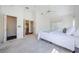 Sun-filled primary bedroom featuring vaulted ceilings and neutral tones for a relaxing atmosphere at 5342 Sagamore Ct, New Port Richey, FL 34655