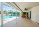 Relaxing covered patio with dining and direct views of the screened pool and backyard at 5342 Sagamore Ct, New Port Richey, FL 34655