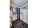 Spacious walk-in closet with shelves and hanging rods for organized storage at 5342 Sagamore Ct, New Port Richey, FL 34655