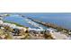 Aerial view of condo buildings near the waterway and marina at 5850 Gasparilla Rd # M5, Boca Grande, FL 33921