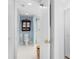 Cozy, renovated bathroom with a glass shower, white tile, and traditional wood cabinet at 5850 Gasparilla Rd # M5, Boca Grande, FL 33921