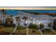 Waterfront condo building with lush landscaping and marina view offers a serene and picturesque setting at 5850 Gasparilla Rd # M5, Boca Grande, FL 33921