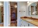 Bright bathroom featuring a tiled shower, modern fixtures, and a vanity with ample counter space at 6269 Palma Del Mar S Blvd # 111, St Petersburg, FL 33715