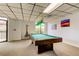 Inviting game room featuring a billiard table under unique pendant lighting, a perfect leisure space at 6269 Palma Del Mar S Blvd # 111, St Petersburg, FL 33715
