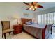 Comfortable main bedroom featuring a decorative ceiling fan, and natural light at 6269 Palma Del Mar S Blvd # 111, St Petersburg, FL 33715