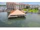 Expansive waterfront community featuring residential buildings, docks, and recreation areas with beautiful clear water views at 634 Edgewater Dr # 744, Dunedin, FL 34698
