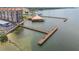 Panoramic aerial view featuring a dock and waterfront condos and buildings at 634 Edgewater Dr # 744, Dunedin, FL 34698