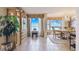 Spacious dining room with water views, elegant furnishings and cabinetry, perfect for entertaining at 634 Edgewater Dr # 744, Dunedin, FL 34698
