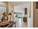 Inviting hallway with tile floors leading to a spacious living area and stunning views at 634 Edgewater Dr # 744, Dunedin, FL 34698