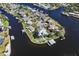 Areal view of waterfront neighborhood with canals and docks at 829 Blue Heron Blvd, Ruskin, FL 33570