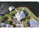 Overhead aerial view of the home and its surroundings on the waterfront at 829 Blue Heron Blvd, Ruskin, FL 33570