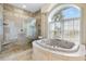 Bathroom showing a jetted tub and walk-in shower at 829 Blue Heron Blvd, Ruskin, FL 33570