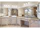 Bathroom showcasing dual sinks and a jetted tub at 829 Blue Heron Blvd, Ruskin, FL 33570