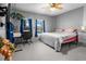 Bedroom offering serene view and natural light through the windows overlooking the pool at 829 Blue Heron Blvd, Ruskin, FL 33570
