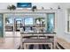 Bright dining area with large sliding glass doors and views of the screened porch at 829 Blue Heron Blvd, Ruskin, FL 33570