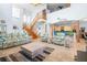 Open-concept living room with tile flooring and a staircase at 829 Blue Heron Blvd, Ruskin, FL 33570