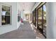 Covered patio with access to a beautiful garden at 829 Blue Heron Blvd, Ruskin, FL 33570