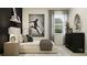Inviting bedroom with a view of a window and a picture of a soccer player at 9640 Runaway Breeze Dr, Land O Lakes, FL 34637