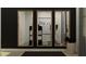 Mirrored view of an exercise room with workout equipment and yoga mats at 9640 Runaway Breeze Dr, Land O Lakes, FL 34637