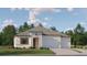 Charming single-story home featuring a symmetrical design and a well-maintained lawn at 9640 Runaway Breeze Dr, Land O Lakes, FL 34637