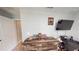 Bright bedroom with modern gamer setup and neutral decor at 10115 Paradise Fish Dr, Riverview, FL 33578