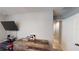 Modern bedroom with desk and TV for play and relaxation at 10115 Paradise Fish Dr, Riverview, FL 33578