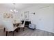 Cozy dining area with a round table, seating for four, and stylish decor at 10216 Regal Dr # 405, Largo, FL 33774