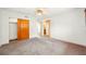 Bedroom with ceiling fan and closet, adjacent to bathroom at 11601 86Th Ave, Seminole, FL 33772