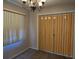 Dining room featuring vertical blinds and folding doors at 11601 86Th Ave, Seminole, FL 33772