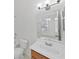 Bright bathroom with a tub and a sink, with a large mirror at 1256 Redondo Way, Wesley Chapel, FL 33543